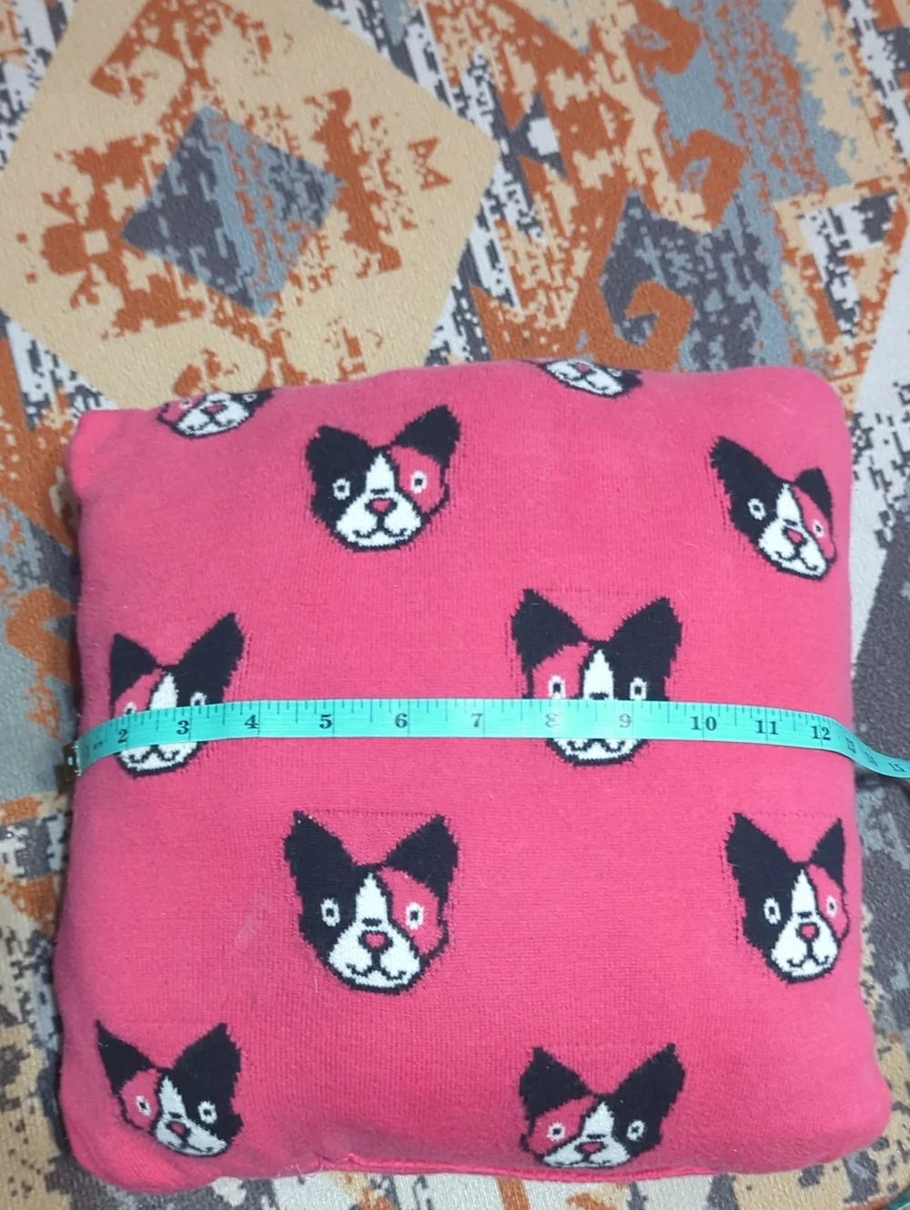 upcycled knit sweaters, featuring a gray pillow with a French bulldog Harlequin